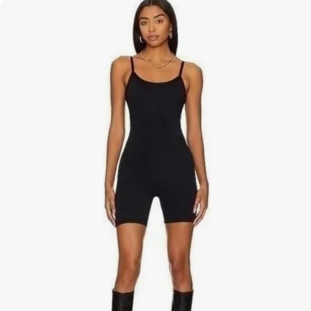 Good American 	STRAPPY SCOOP BIKER JUMPSUIT - black, no tags, never worn